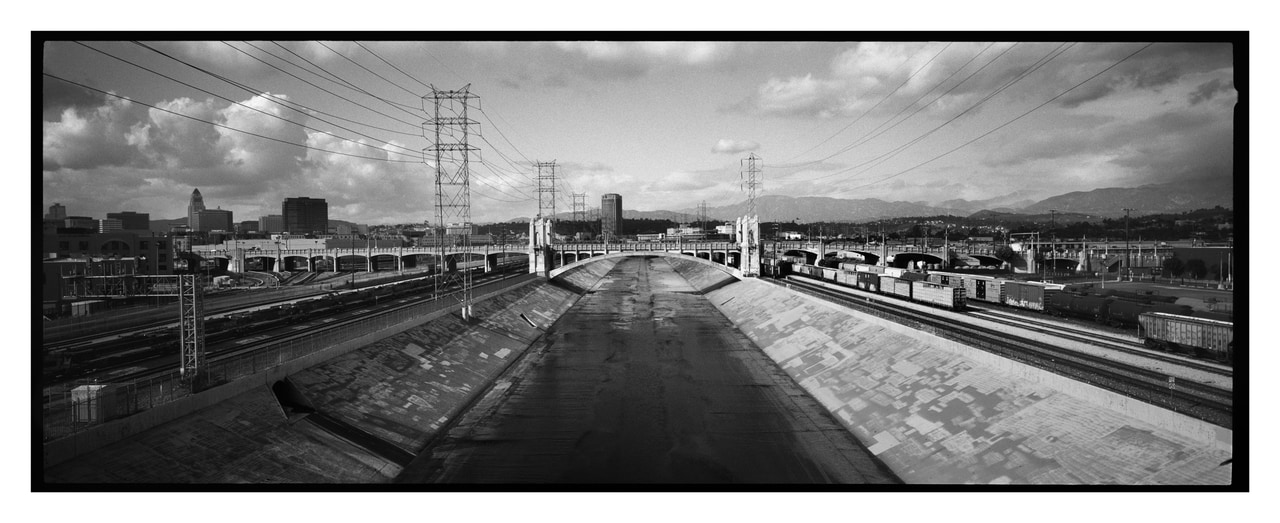 A concrete river channel crossed by bridges in Los Angeles